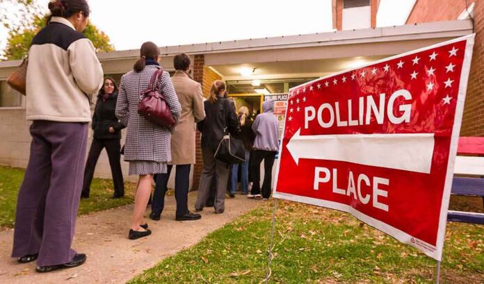 Voters standing in line outside a polling place