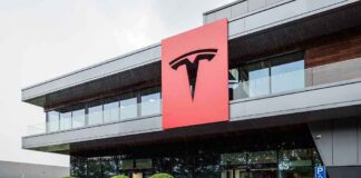 Tesla office building with large red logo sign