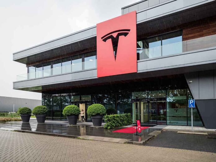 shutterstock_1118174948 Tesla office building with large red logo sign