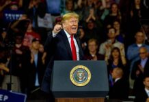 Trump Pleads With Midterm Voters Midterms – Doubles Down on $5000 Payment Donald Trump speaking at a rally behind a presidential podium