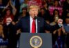 Trump Suffers Heartbreaking Revelation On Campaign Trail Donald Trump speaking at a rally podium with arms raised