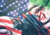 Missile launchers in front of U.S. and Iranian flags