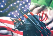 GOP Opponent Stuns Cory Booker in Debate With Amazing Answer on Iran Missile launchers in front of U.S. and Iranian flags