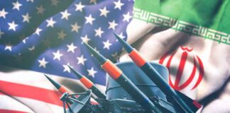 Missile launchers in front of U.S. and Iranian flags