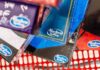 Pistol-Packing Mom Holds Up Toystore Workers Hasbro Gaming board game boxes in a shopping cart