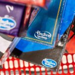 Pistol-Packing Mom Holds Up Toystore Workers Hasbro Gaming board game boxes in a shopping cart