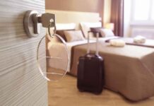 Resort Horror: Family Massacred By Murderous Mom Hotel room key in door with suitcase by bed