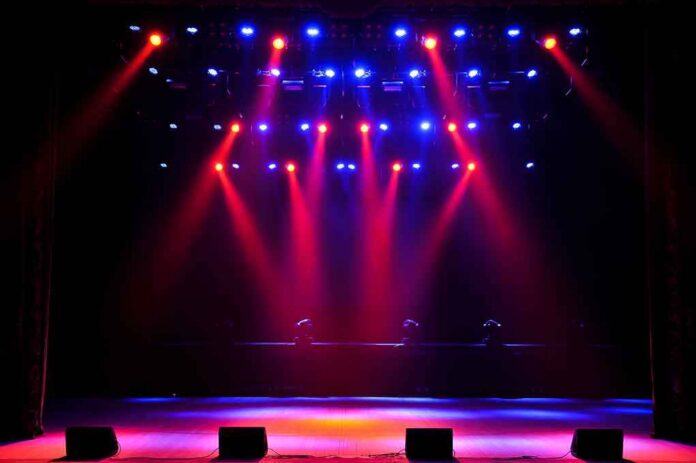 shutterstock_394110052 stage with red and blue spotlights shining onto an empty floor