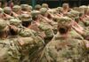 Trump Kills Execution Plan – Proposes NEW Idea Soldiers in camouflage uniforms salute in formation